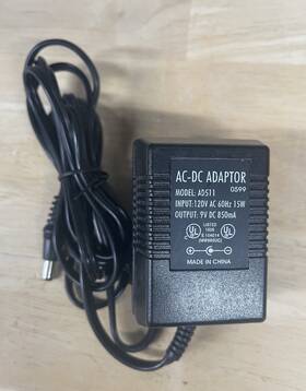 Adapter Ad511 9v Dc 850ma 120vac 60hz 15w Id1.57mm Od5.37mm Tip Negative