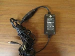 + Skynet Electronic Ac Adapter 5V Model SNP-Q316 Genuine Used. Price: $9.50.