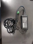 Huntkey HKA06012050-7F Ac Dc Adapter 12V5A All-in-one Display Charger Used. Price: $25.00.
