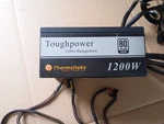 Thermaltake Toughpower 1200W Supply TP-1200AH5CES Used. Price: $60.00.
