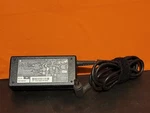 Genuine Hp Ac Adapter Model TPC-LA581 Used. Price: $9.00.