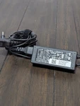 Genuine Dell Ac/dc Adapter ADP-65TH F Model #: DA65NM111-00 W/ Power Cord Tested Used. Price: $13.00.