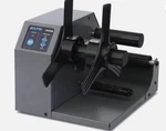 Sato, RWG500, 5IN Rewinder Used. Price: $130.00.