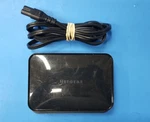Powerline Adapter With Ethernet Switch , XAV1004 Netgear Port Used. Price: $25.00.